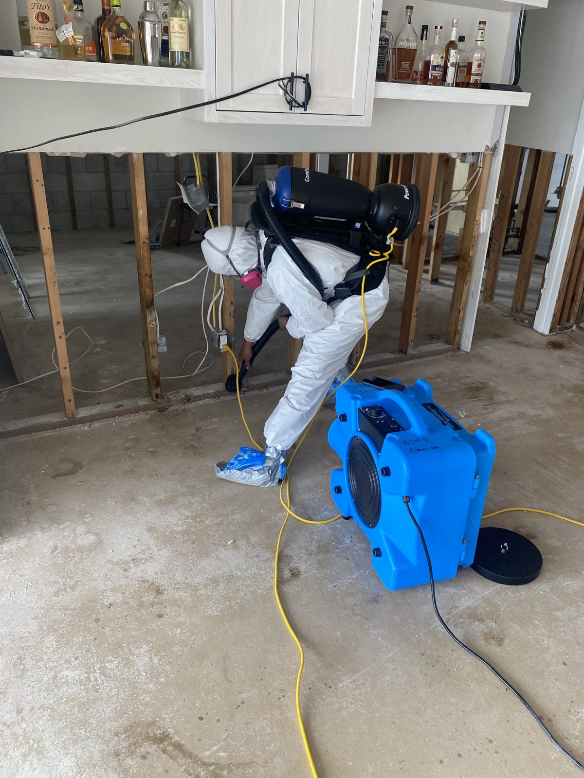 AIM 4 Clean Air technician running HEPA air filtration equipment during an allergy-safe mold remediation